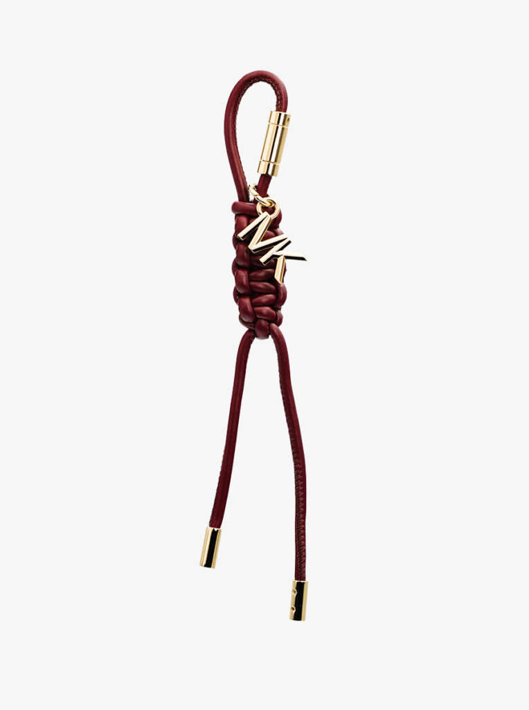 Logo woven charm